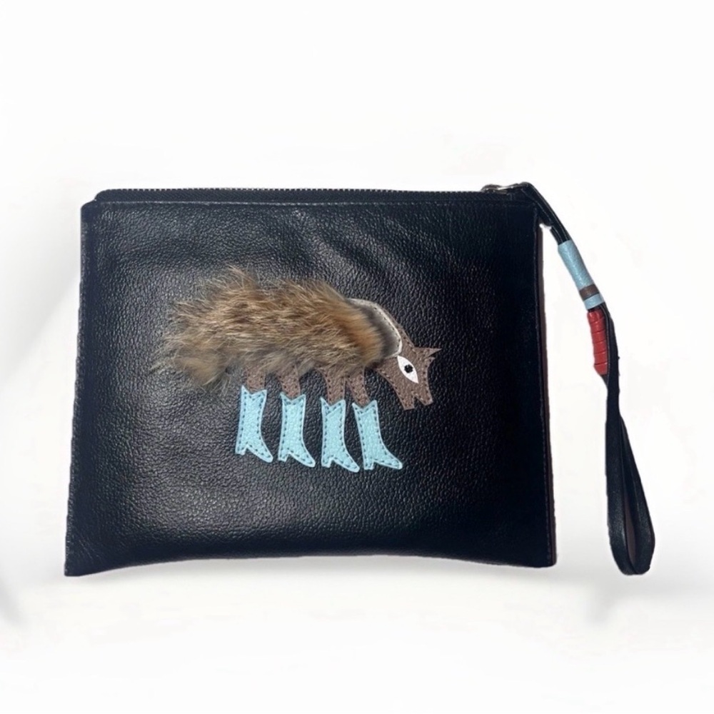 Min & Mon retired coyote wearing blue boots wristlet